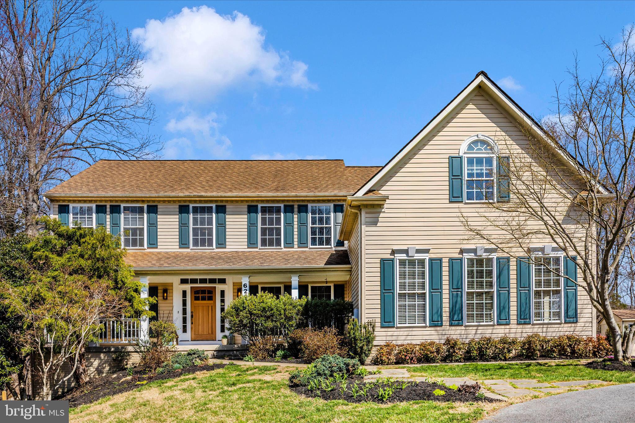 6243 Woodville Road Mount Airy, MD 21771 - Photo 2 of 50 front view of a house with a yard