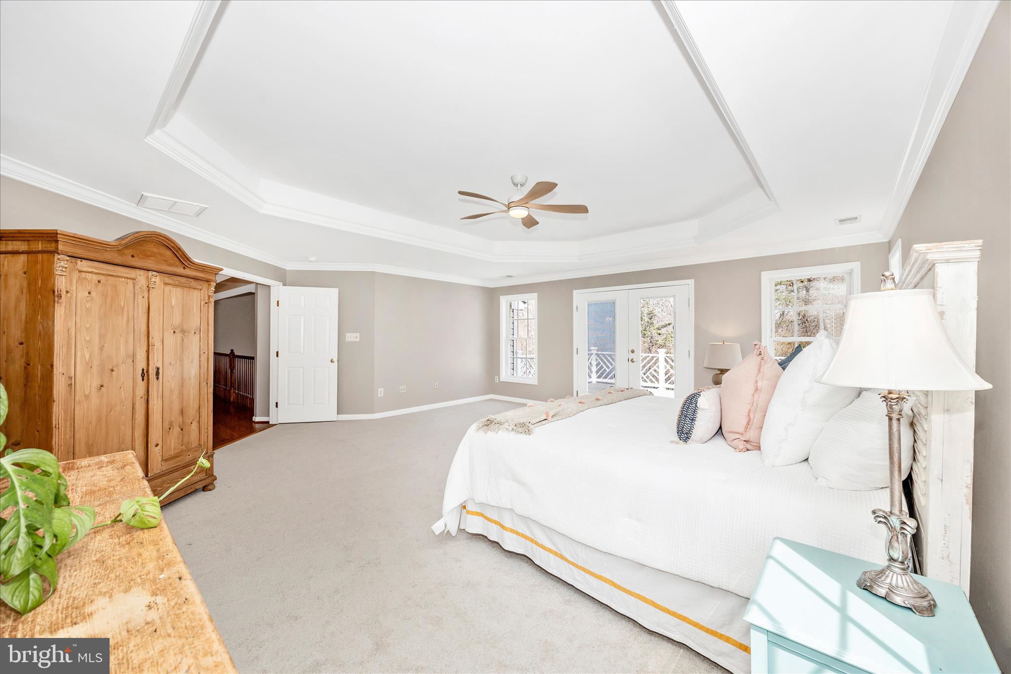 6243 Woodville Road Mount Airy, MD 21771 - Photo 22 of 50 a bedroom with a bed and a table