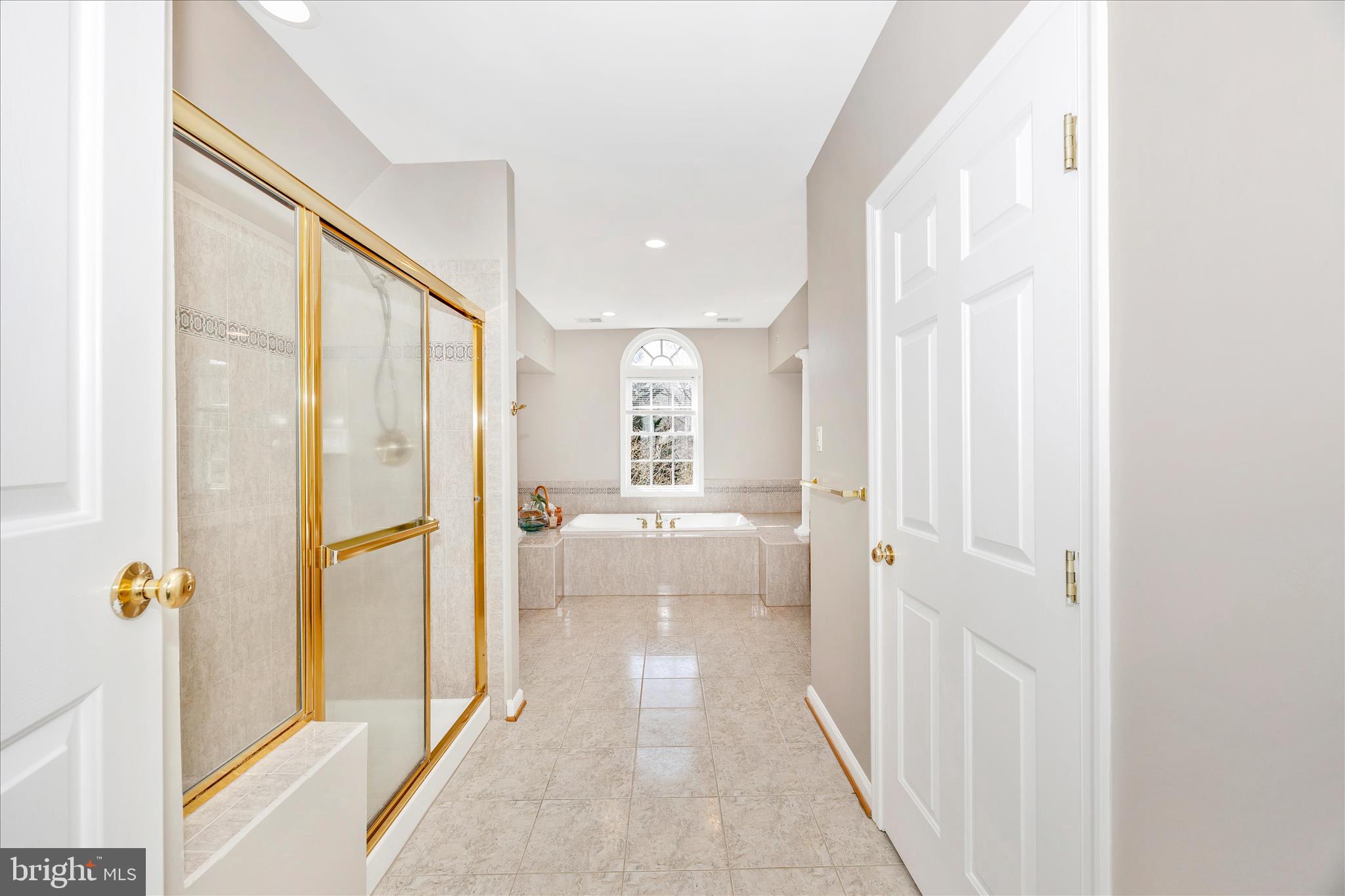 6243 Woodville Road Mount Airy, MD 21771 - Photo 23 of 50 a view of a hallway with bathroom and wooden floor