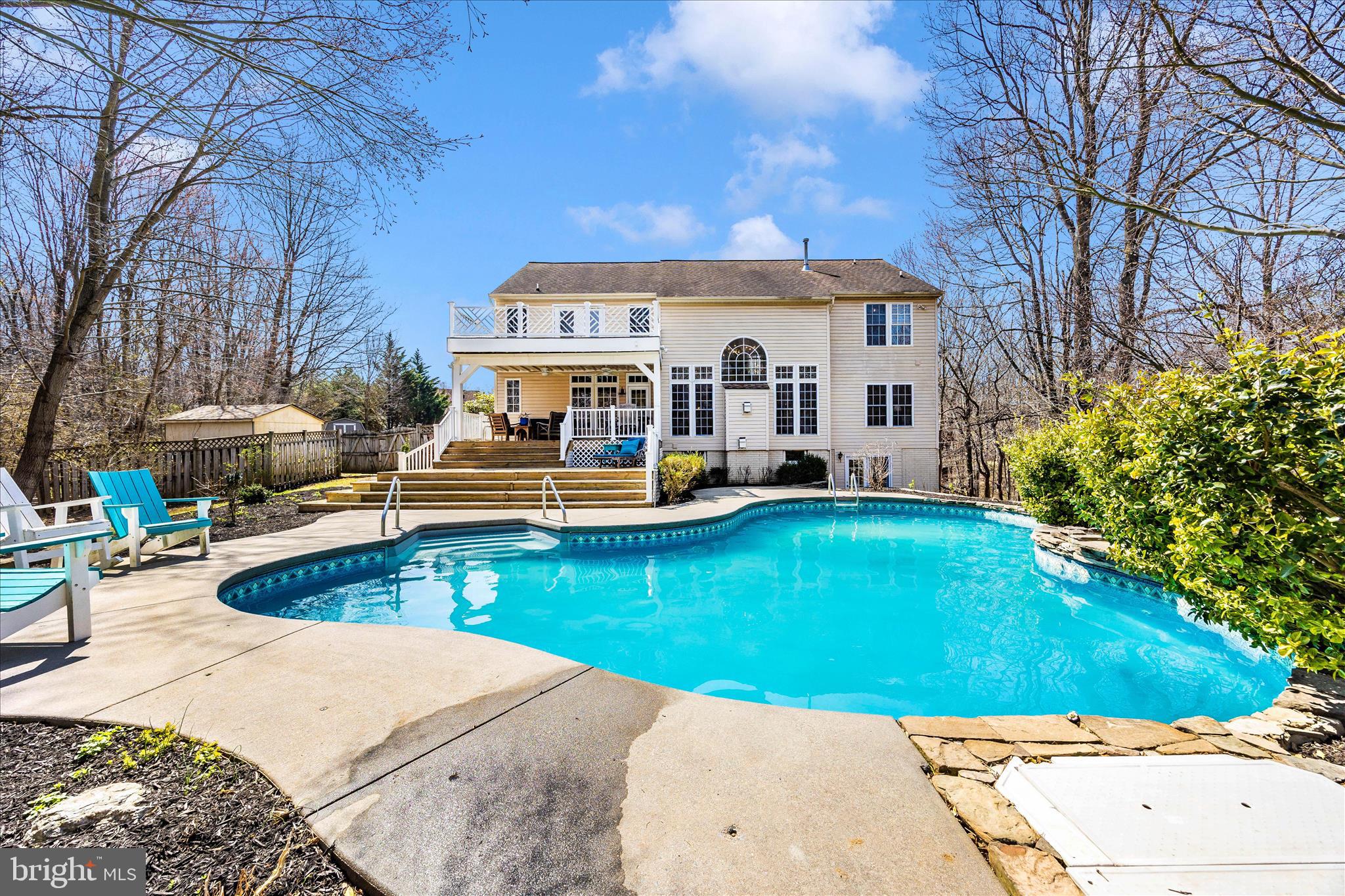 6243 Woodville Road Mount Airy, MD 21771 - Photo 39 of 50 a view of a house with pool and chairs