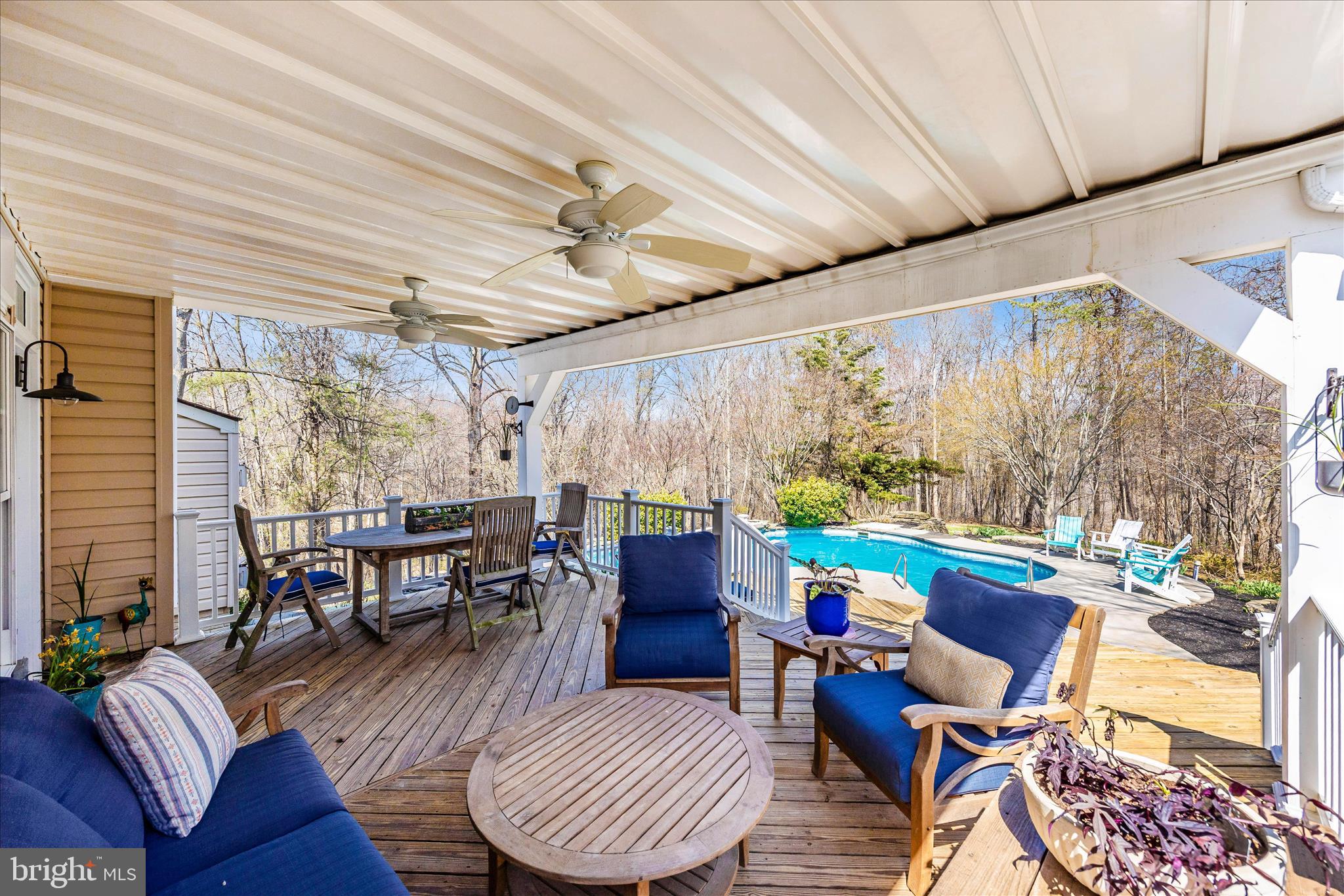 6243 Woodville Road Mount Airy, MD 21771 - Photo 42 of 50 a living room with furniture and a large window