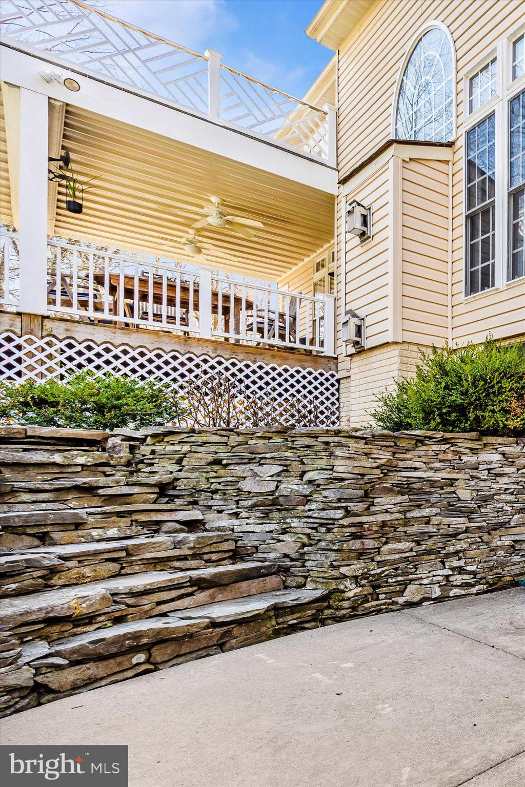 6243 Woodville Road Mount Airy, MD 21771 - Photo 44 of 50 a view of a brick house with a street