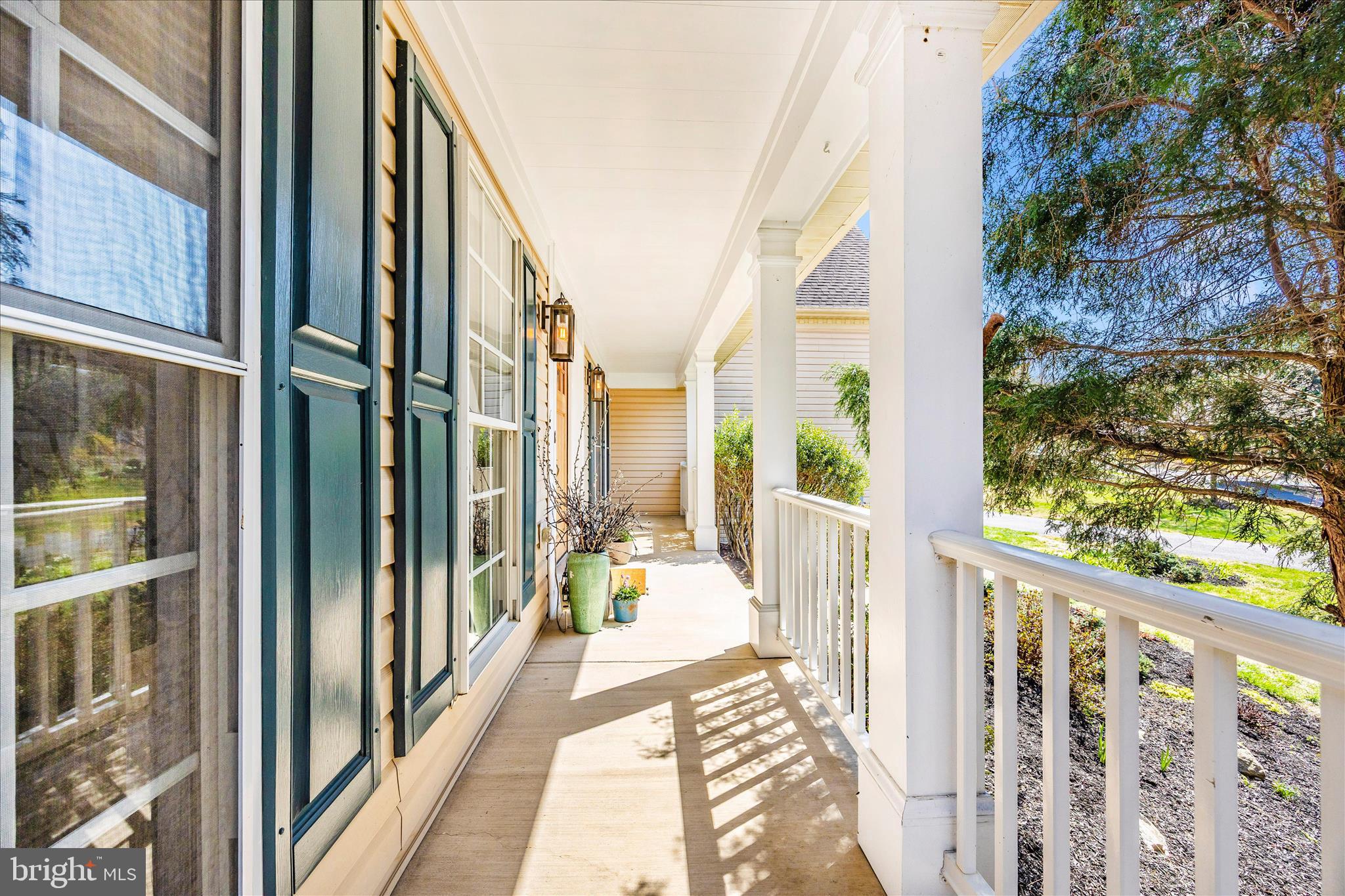 6243 Woodville Road Mount Airy, MD 21771 - Photo 48 of 50 a view of a balcony with wooden floor