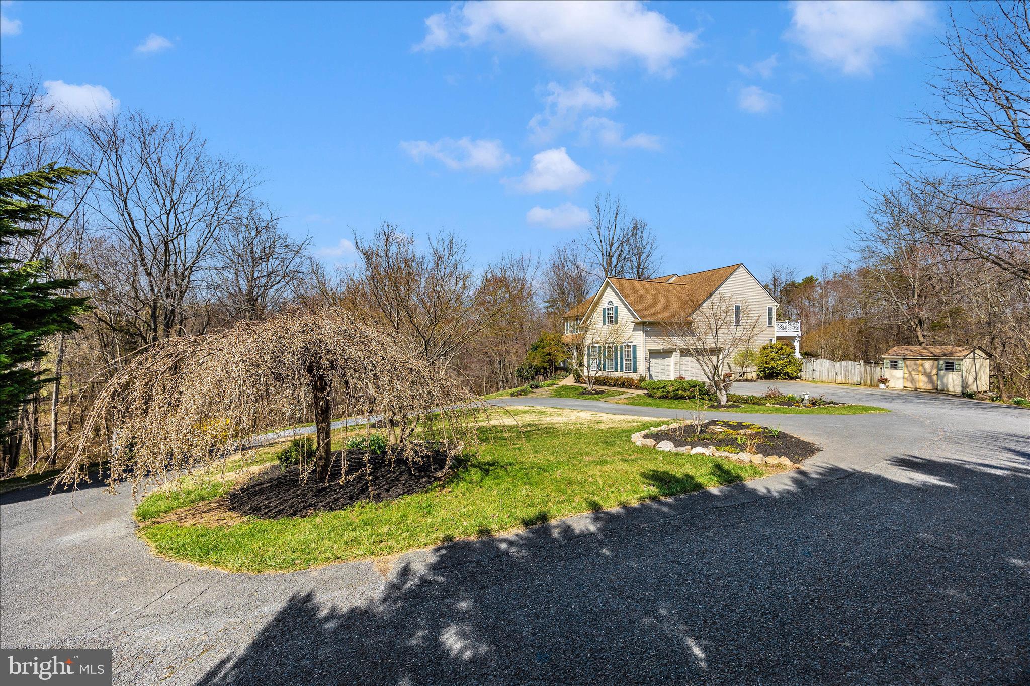 6243 Woodville Road Mount Airy, MD 21771 - Photo 50 of 50 a view of a house with swimming pool and a yard