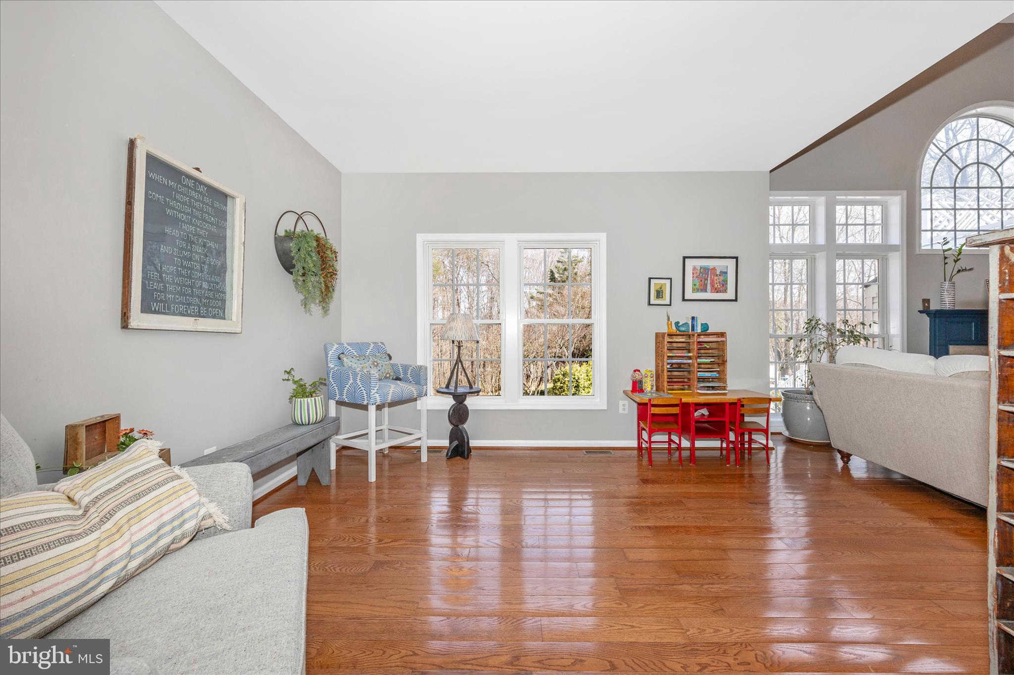 6243 Woodville Road Mount Airy, MD 21771 - Photo 5 of 50 a living room with furniture and a large window