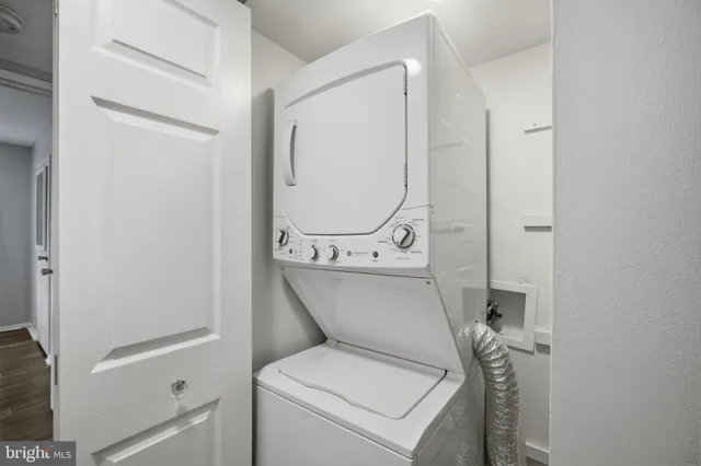 a view of bathroom with a toilet and a sink