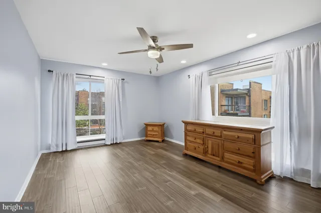a view of livingroom with furniture wooden floor and window