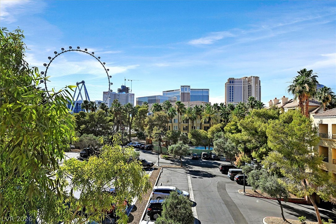 220 East Flamingo Road, Unit 305 Las Vegas, NV 89169 - Photo 26 of 26 Vistas of the urban landscape and a colossal observation wheel frame this vibrant community setting.