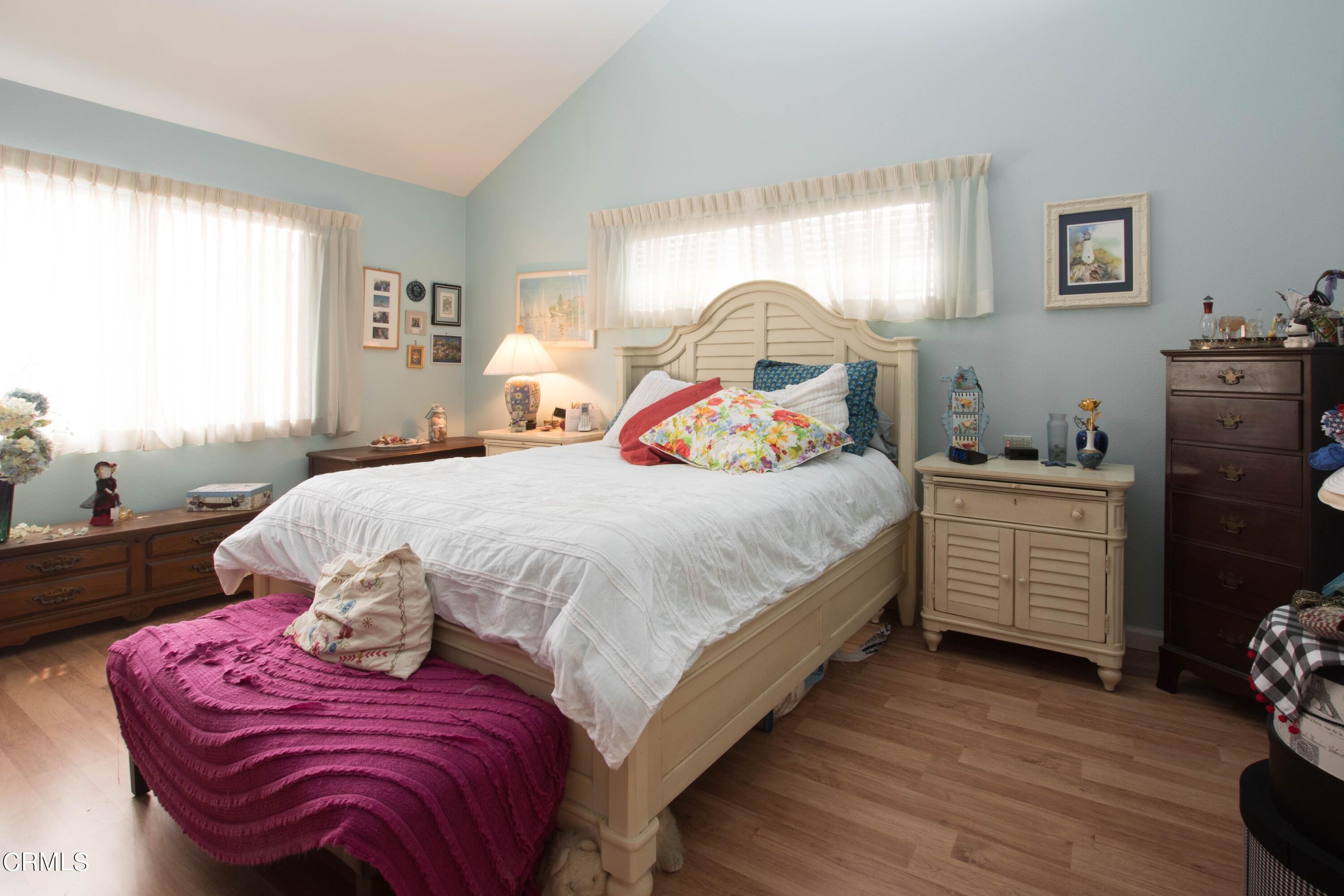 456 West Wooley Road Oxnard, CA 93030 - Photo 6 of 17 a bedroom with a bed and a window