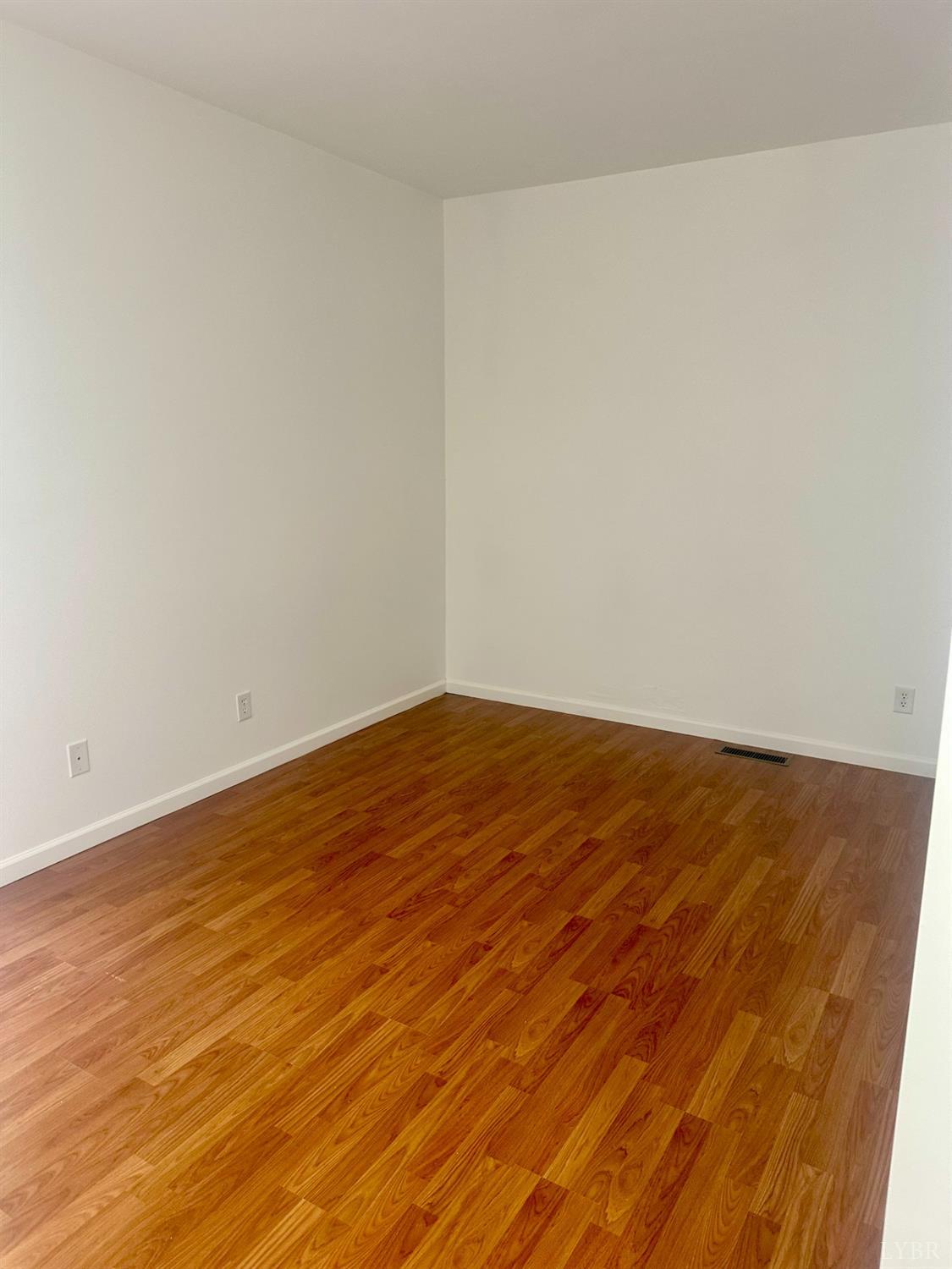 476 Kenmore Road Amherst, VA 24521 - Photo 22 of 32 a view of empty room with wooden floor