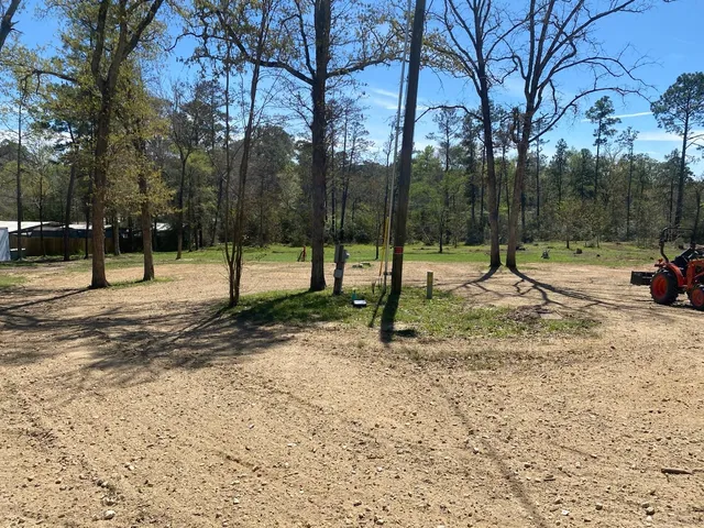 a view of park with swings