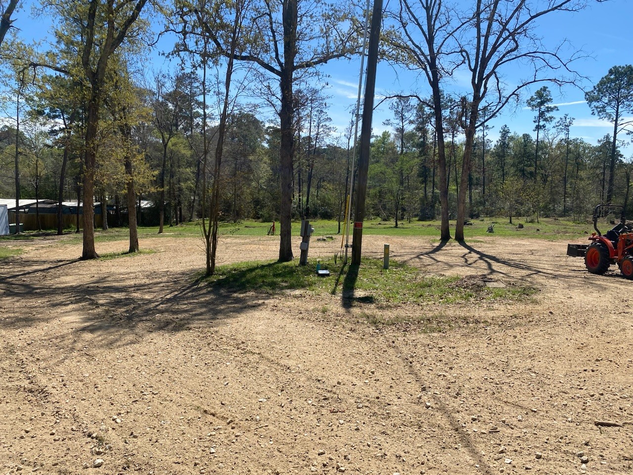 210 Mission Onalaska, TX 77360 - Photo 2 of 10 a view of park with swings