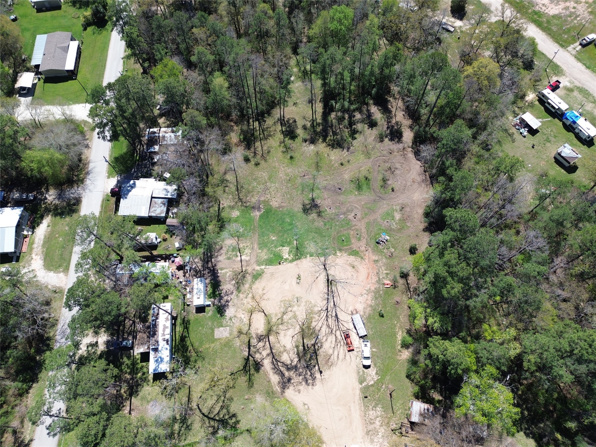 210 Mission Onalaska, TX 77360 - Photo 4 of 10 an aerial view of a house with a yard