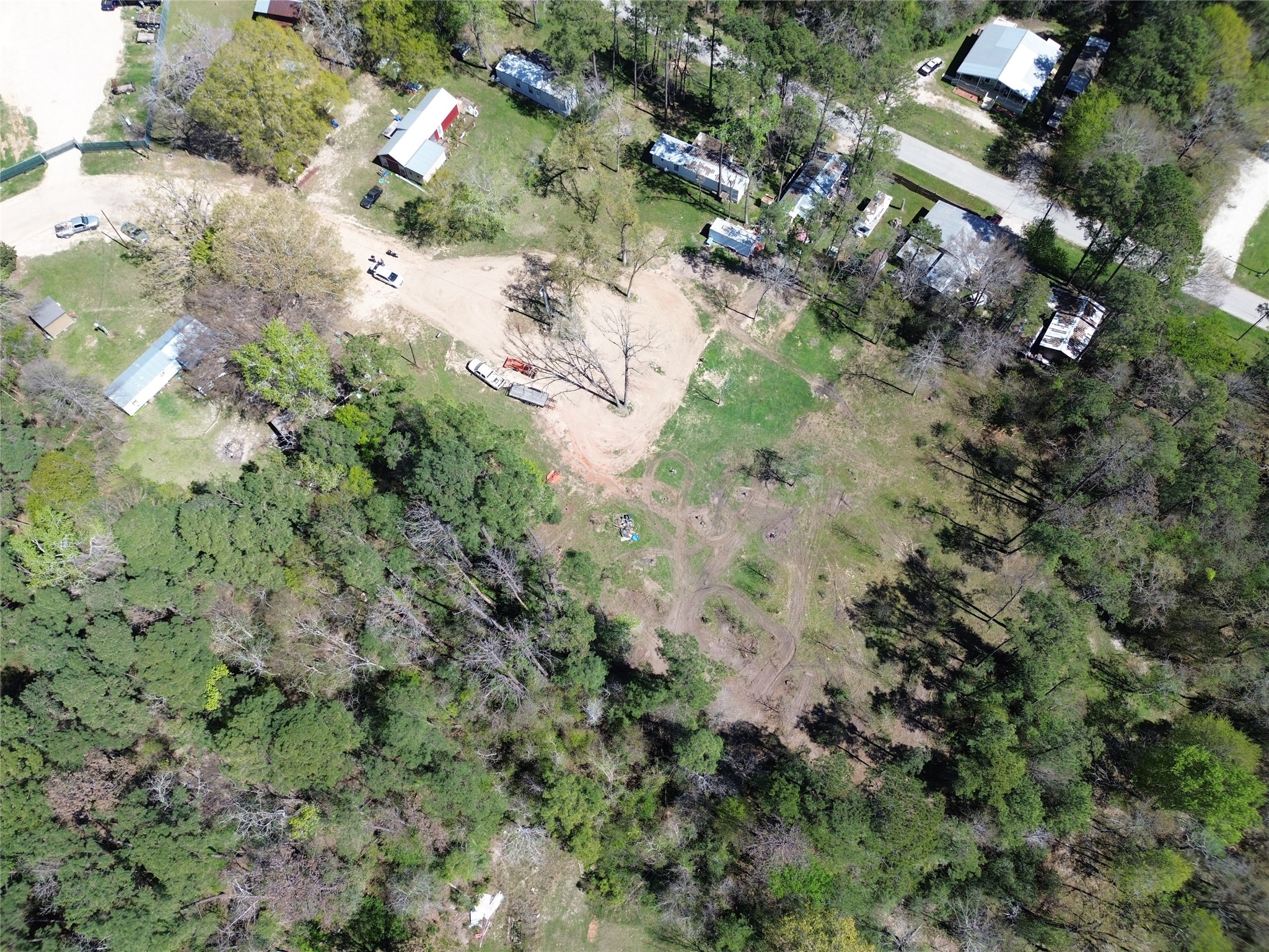 210 Mission Onalaska, TX 77360 - Photo 5 of 10 an aerial view of residential houses with outdoor space