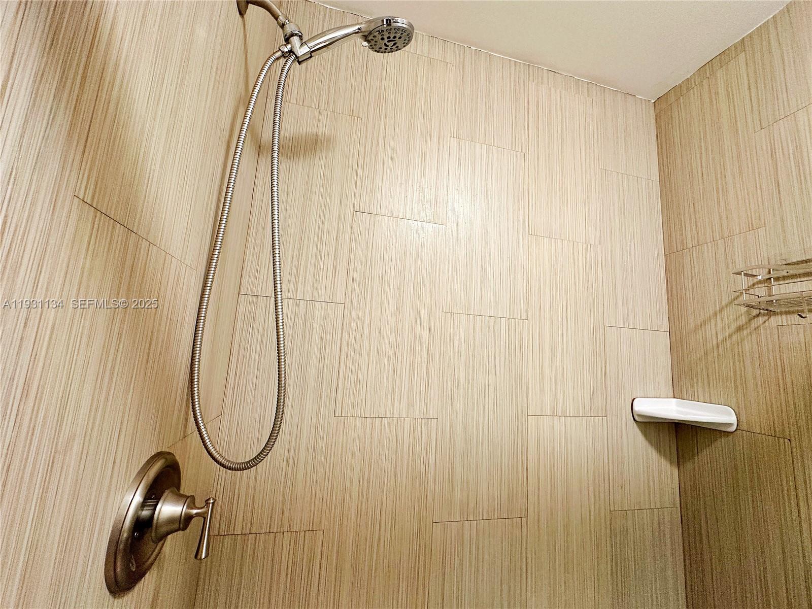 2153 Southwest 14th Terrace, Unit 1 Miami, FL 33145 - Photo 11 of 17 a bathroom with a shower