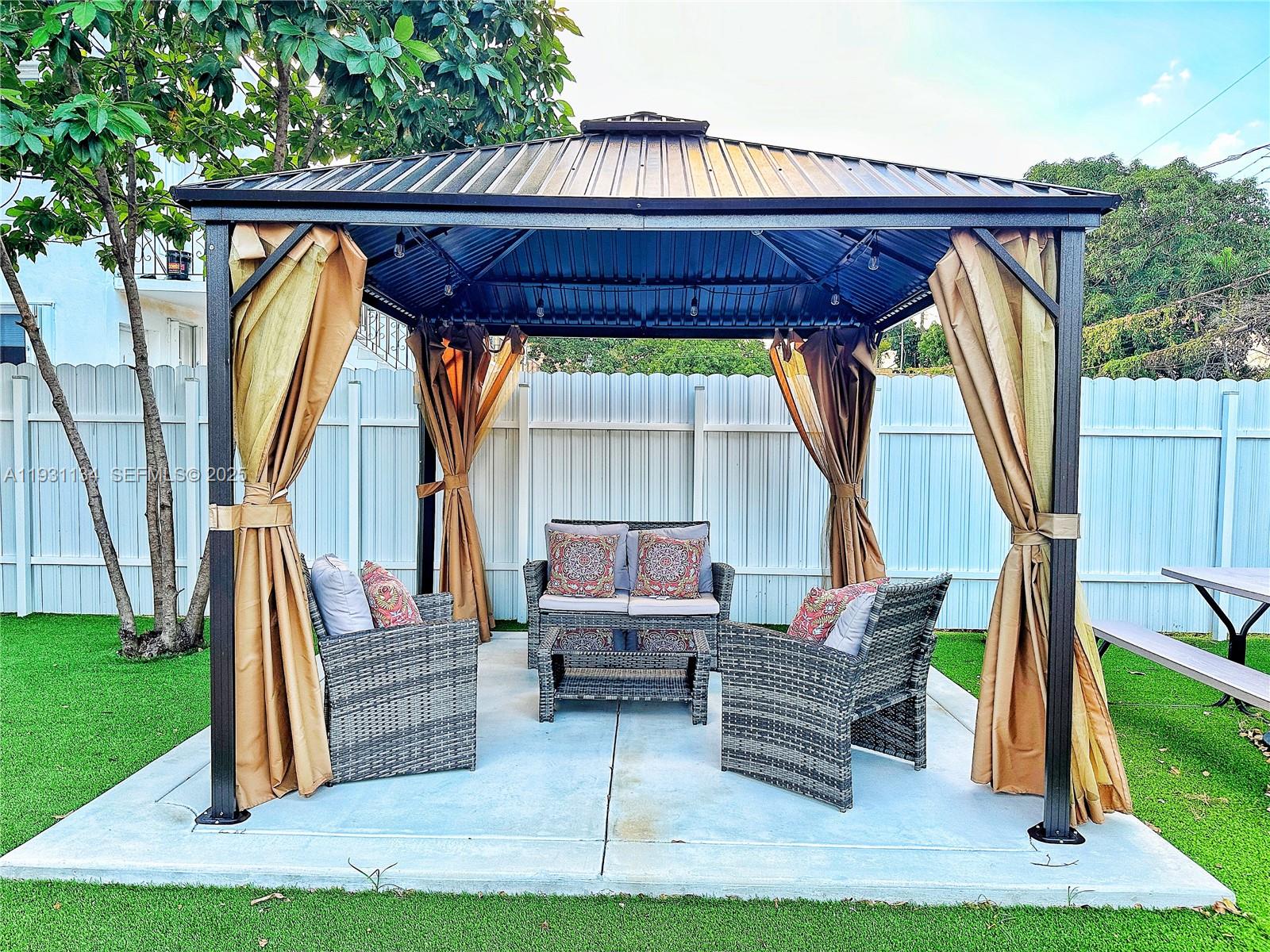 2153 Southwest 14th Terrace, Unit 1 Miami, FL 33145 - Photo 13 of 17 a view of outdoor space with seating