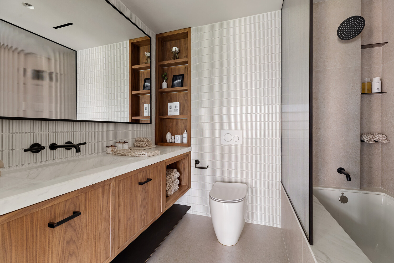 34 West 12th Street Manhattan, NY 10011 - Photo 40 of 53 a bathroom with a bathtub sink mirror and toilet