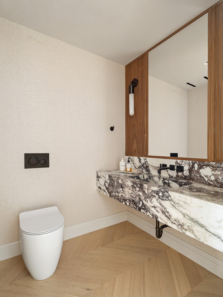 34 West 12th Street Manhattan, NY 10011 - Photo 45 of 53 a bathroom with a sink and a mirror