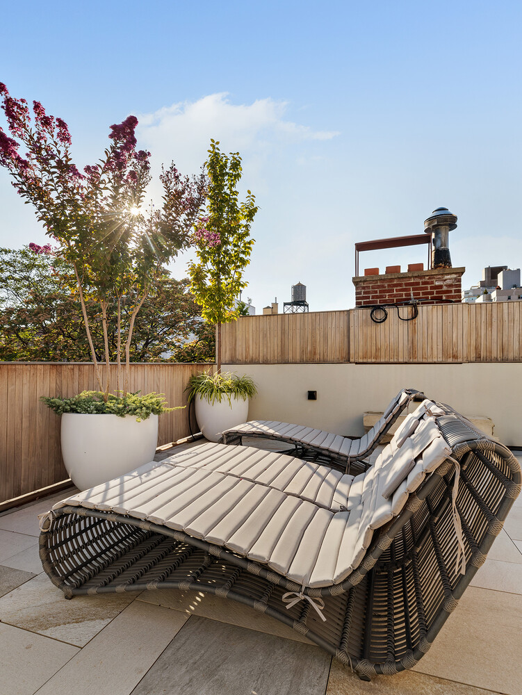 34 West 12th Street Manhattan, NY 10011 - Photo 48 of 53 a view of a chairs and table on the terrace