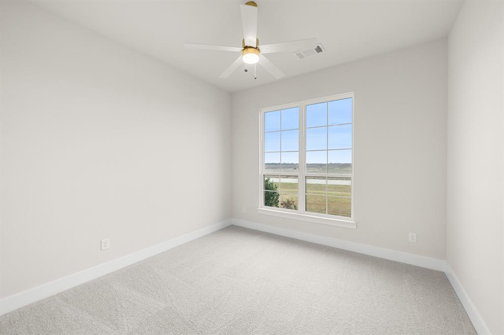 151 Talpin Lane Venus, TX 76084 - Photo 20 of 28 an empty room with a window