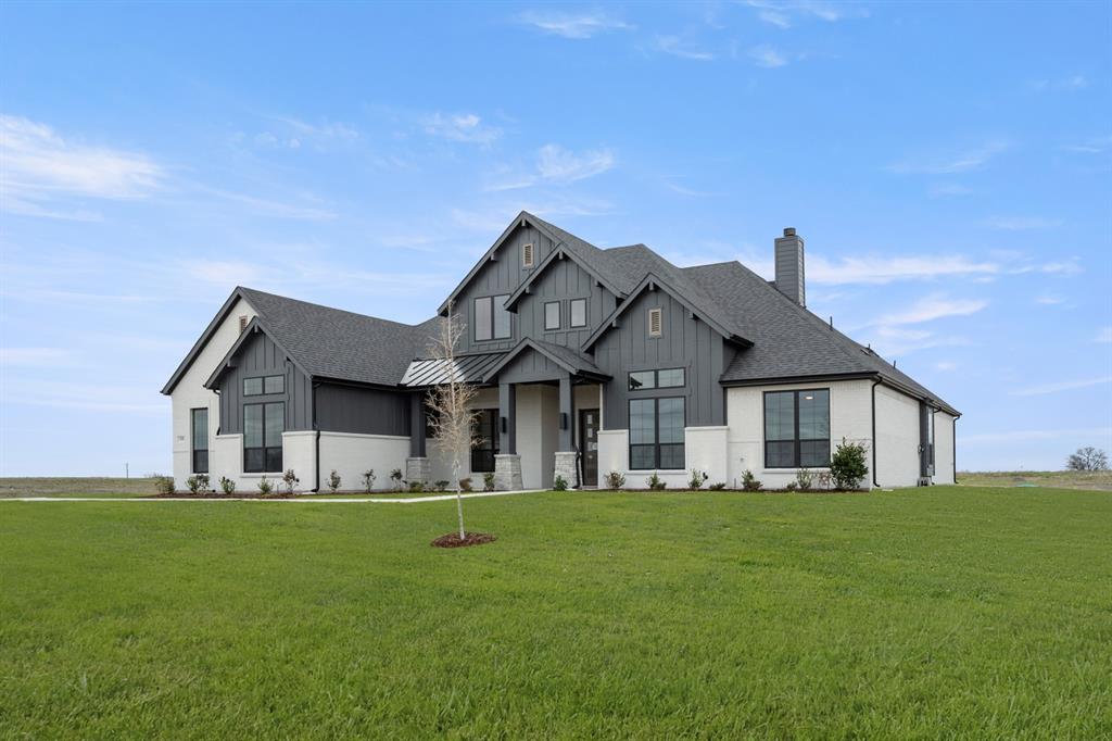 151 Talpin Lane Venus, TX 76084 - Photo 2 of 28 a front view of house with yard and green space