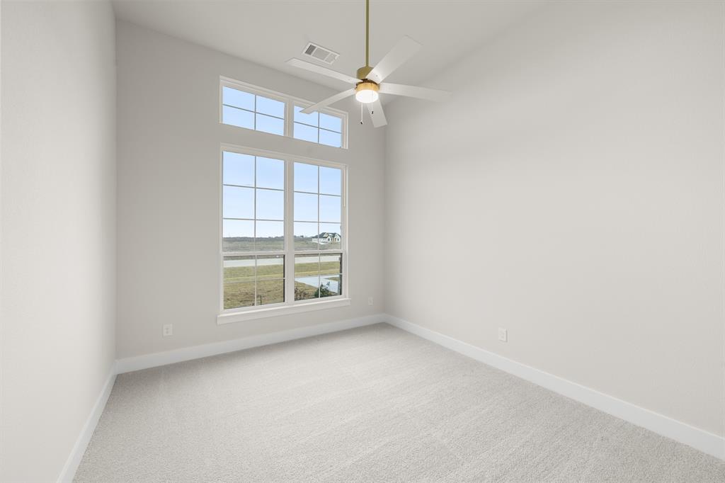 151 Talpin Lane Venus, TX 76084 - Photo 21 of 28 an empty room with a window