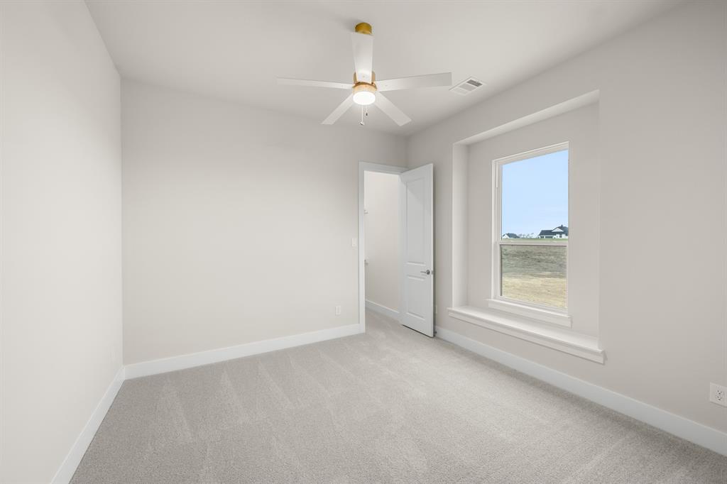 151 Talpin Lane Venus, TX 76084 - Photo 22 of 28 an empty room with a window