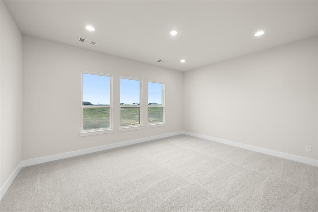 151 Talpin Lane Venus, TX 76084 - Photo 25 of 28 an empty room with a window