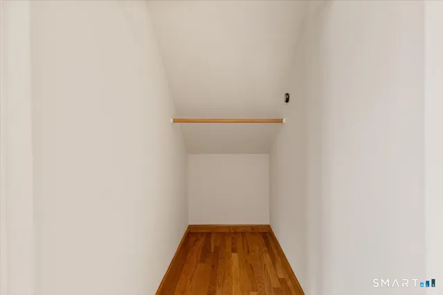 a view of a hallway with front door