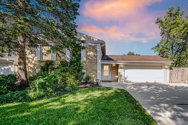 front view of house with a yard