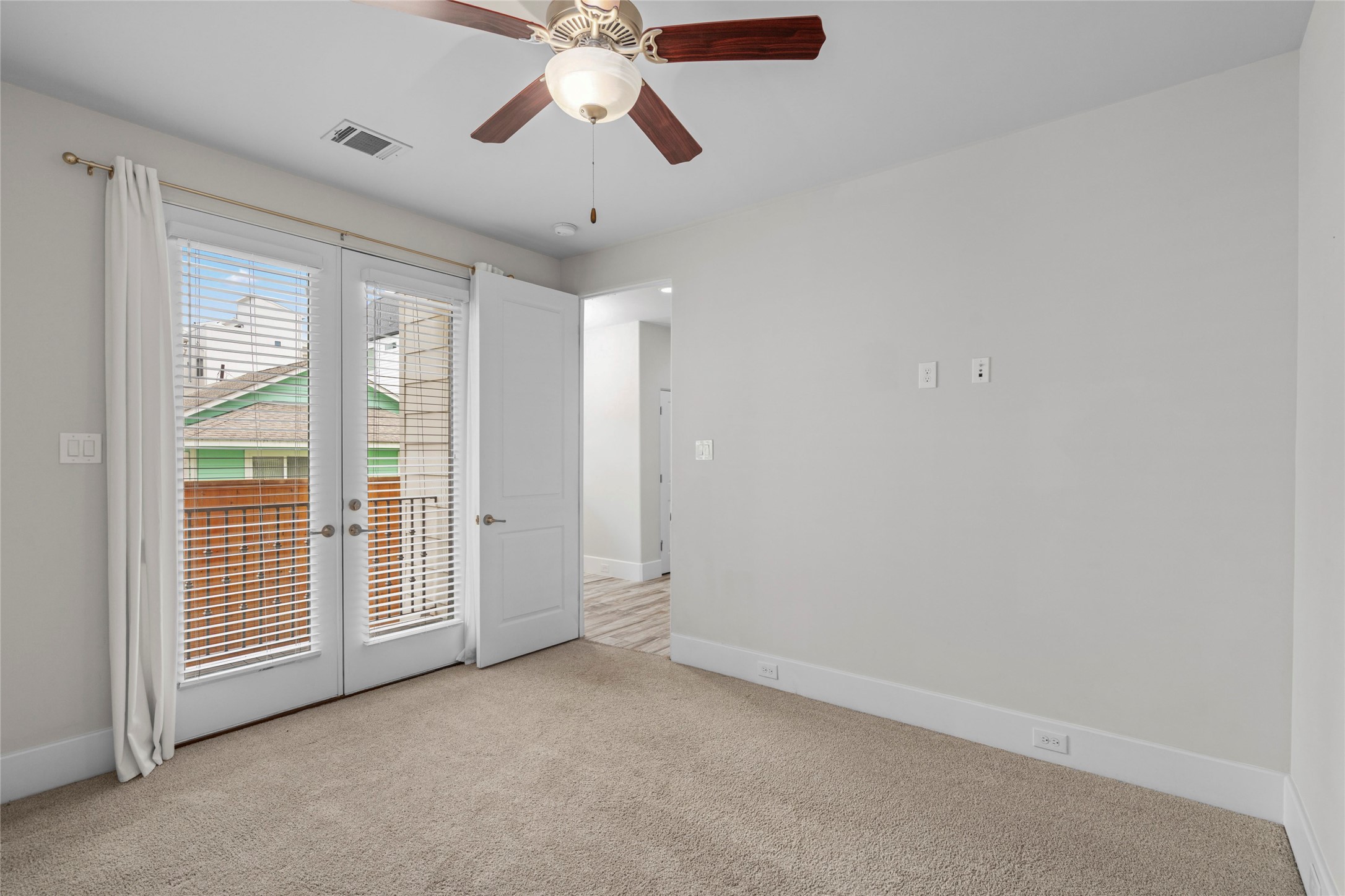 5646 Larkin Street Houston, TX 77007 - Photo 20 of 29 This first floor bedroom also has direct access to the backyard porch and patio.