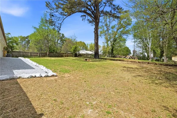 $385,000 | 5542 Joeclay Drive, Stone Mountain, GA 30088