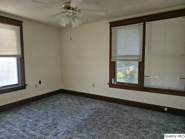 1594 County Road 1500 Carthage, IL 62321 - Photo 17 of 26 an empty room with a window