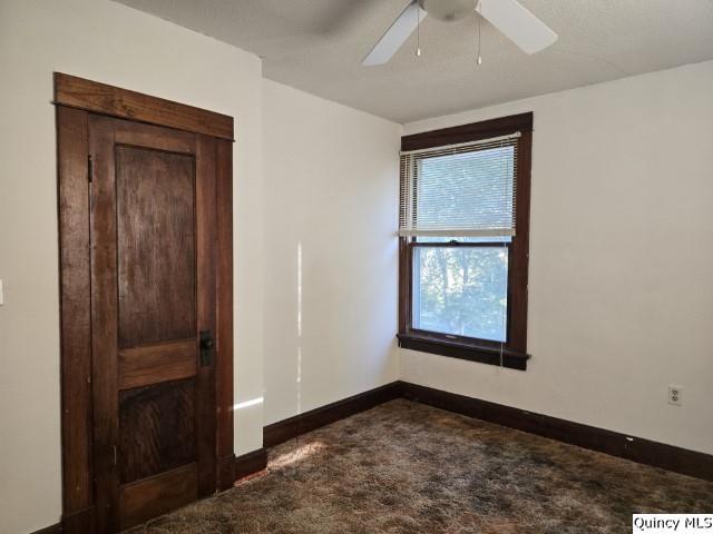 1594 County Road 1500 Carthage, IL 62321 - Photo 20 of 26 an empty room with windows and closet