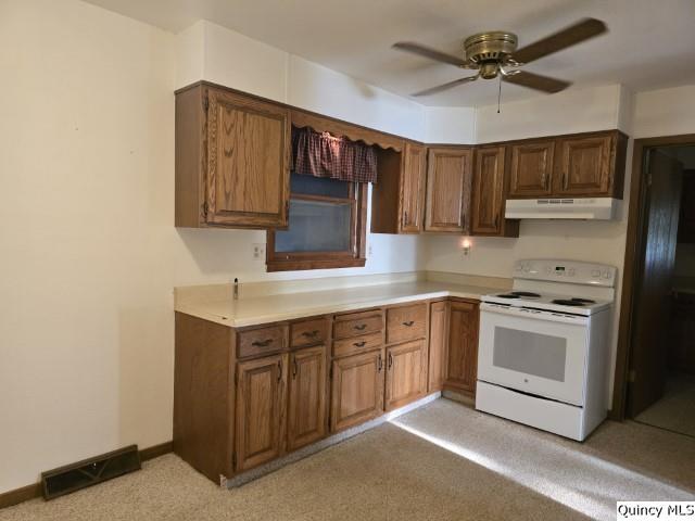 1594 County Road 1500 Carthage, IL 62321 - Photo 2 of 26 a kitchen with stainless steel appliances granite countertop a stove a sink and a refrigerator
