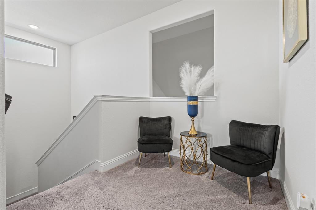 4220 Calla Drive Forney, TX 75126 - Photo 22 of 30 a bedroom with furniture and a potted plant