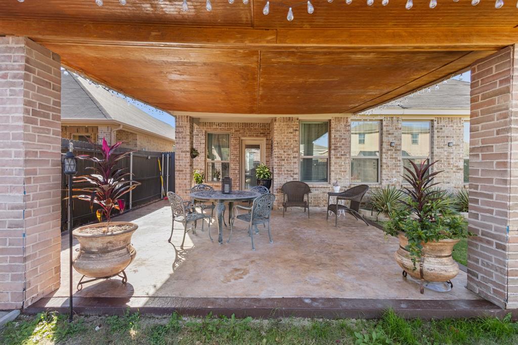4220 Calla Drive Forney, TX 75126 - Photo 24 of 30 a view of living room with furniture and a potted plant