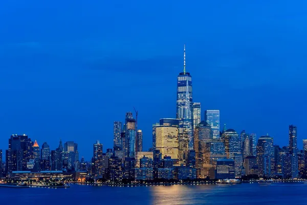 a view of a city with tall buildings in ocean