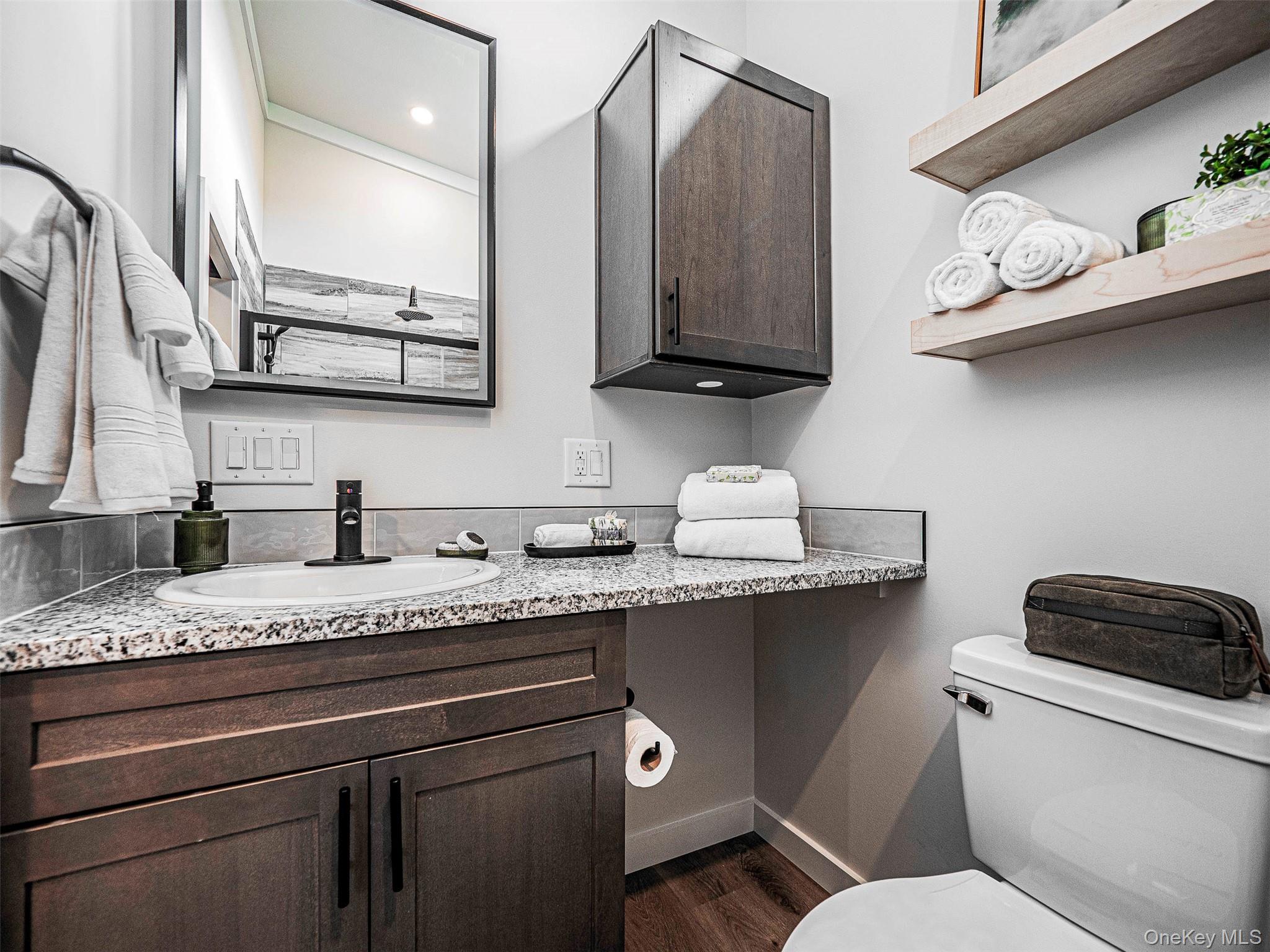 197 Wheeler Road, Unit 91 Florida, NY 10921 - Photo 14 of 48 Bath with dark wood-type flooring and vanity