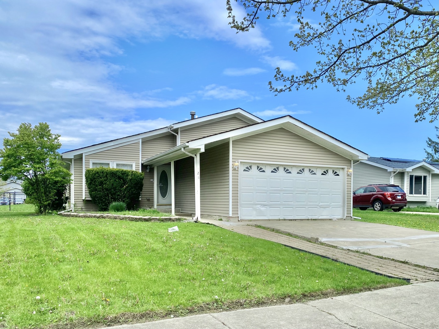 128 Timberlane Road Matteson, IL 60443 - Photo 1 of 28 a view of a house with a garden