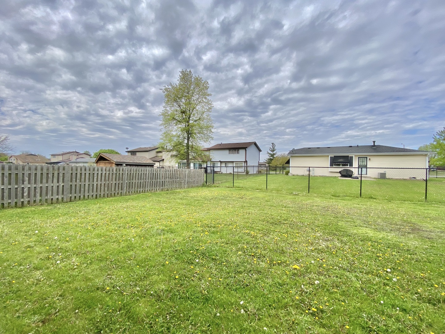 128 Timberlane Road Matteson, IL 60443 - Photo 11 of 28 a view of a house with a yard