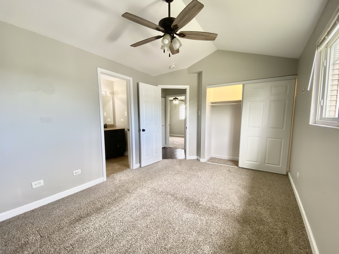 128 Timberlane Road Matteson, IL 60443 - Photo 13 of 28 a view of a livingroom with a chandelier fan and windows