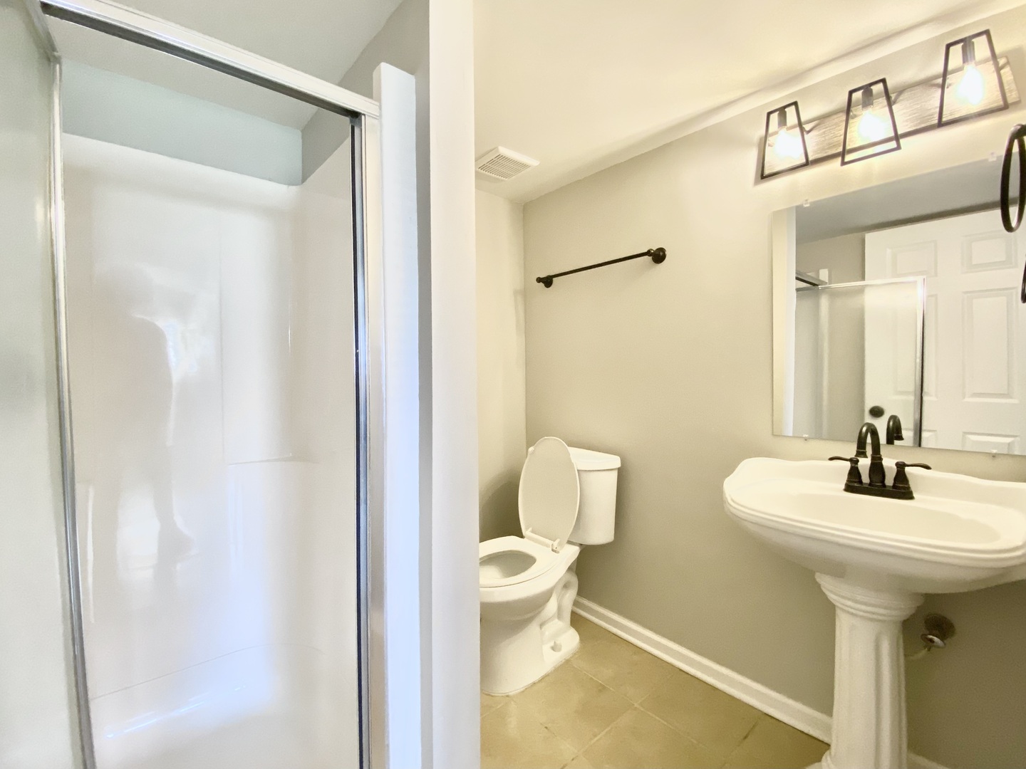 128 Timberlane Road Matteson, IL 60443 - Photo 24 of 28 a bathroom with a sink mirror and toilet