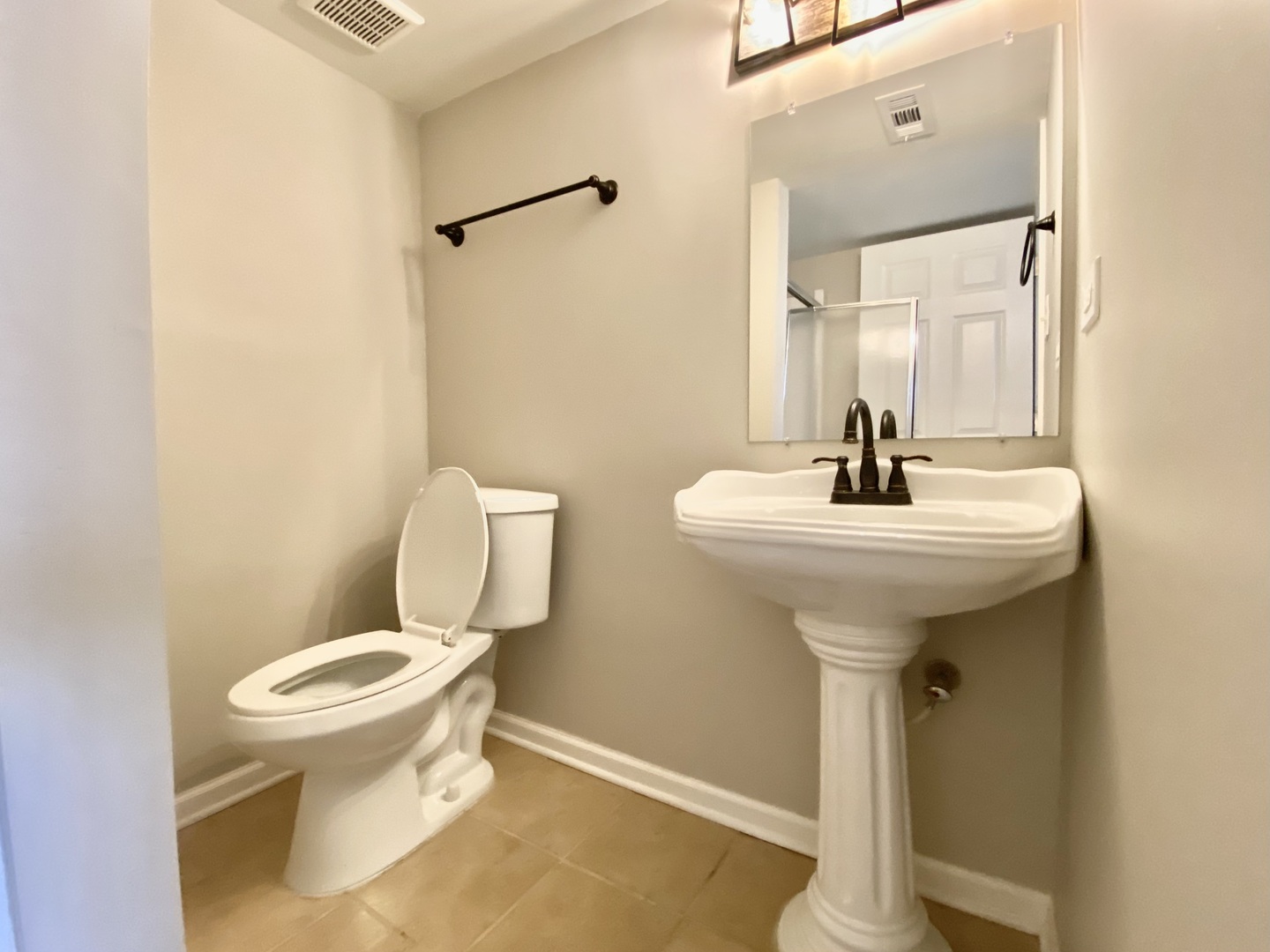128 Timberlane Road Matteson, IL 60443 - Photo 25 of 28 a bathroom with a sink toilet and mirror