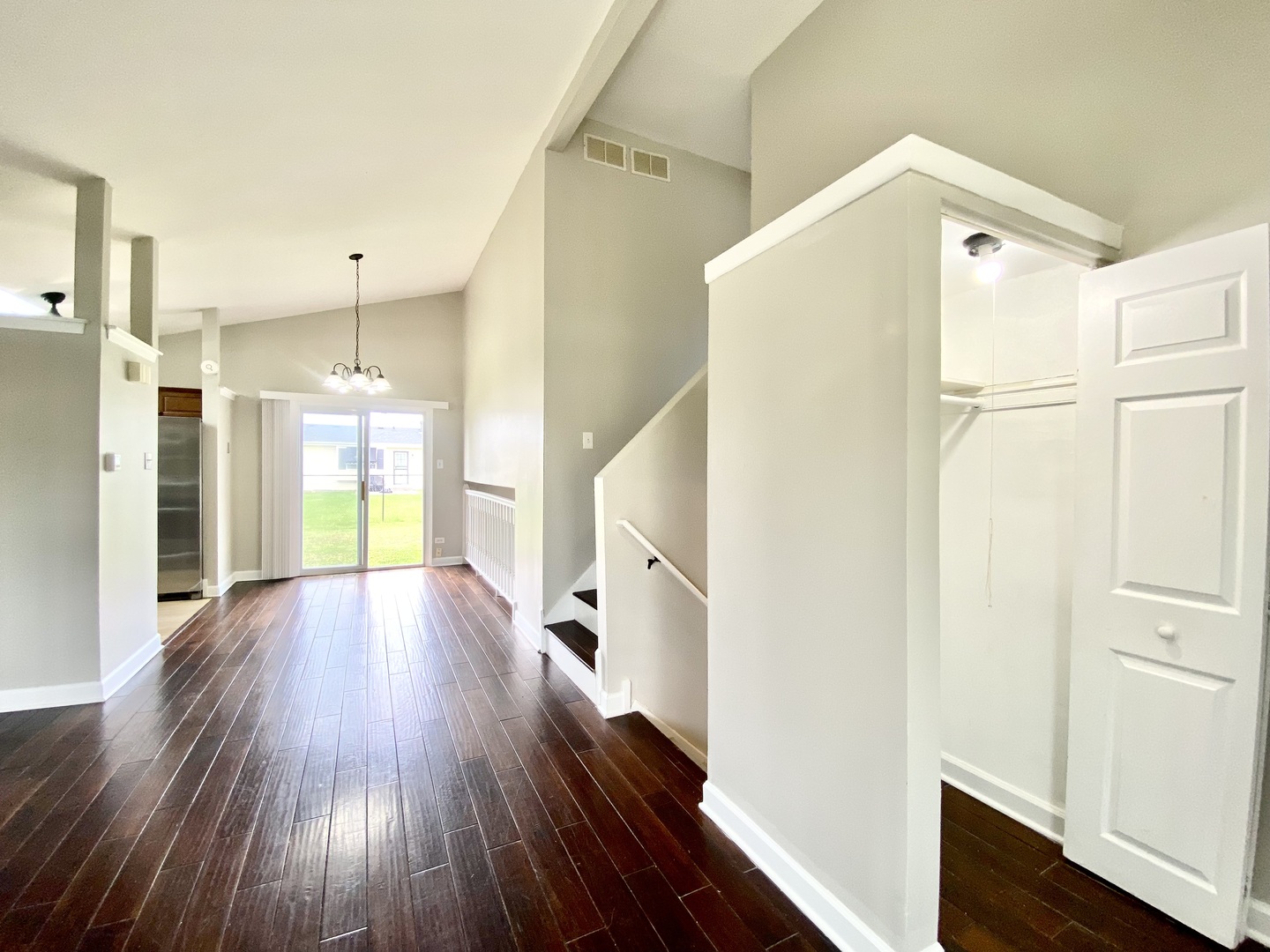 128 Timberlane Road Matteson, IL 60443 - Photo 3 of 28 a view of hallway with wooden floor and staircase
