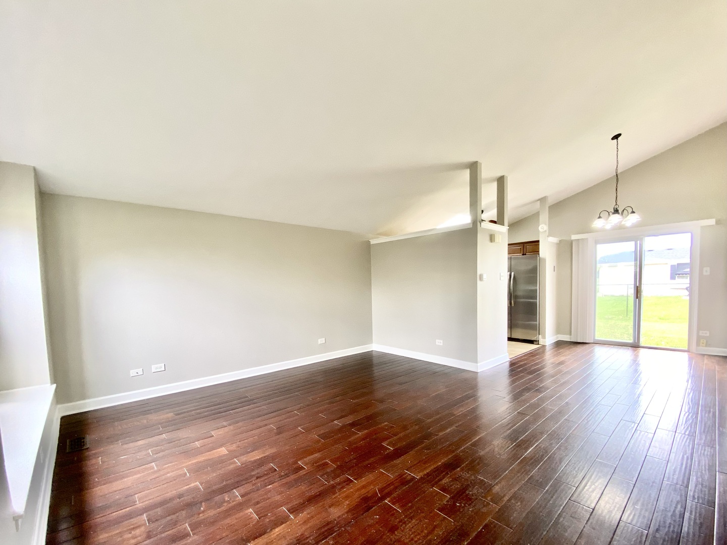 128 Timberlane Road Matteson, IL 60443 - Photo 4 of 28 a view of a room with wooden floor and a window