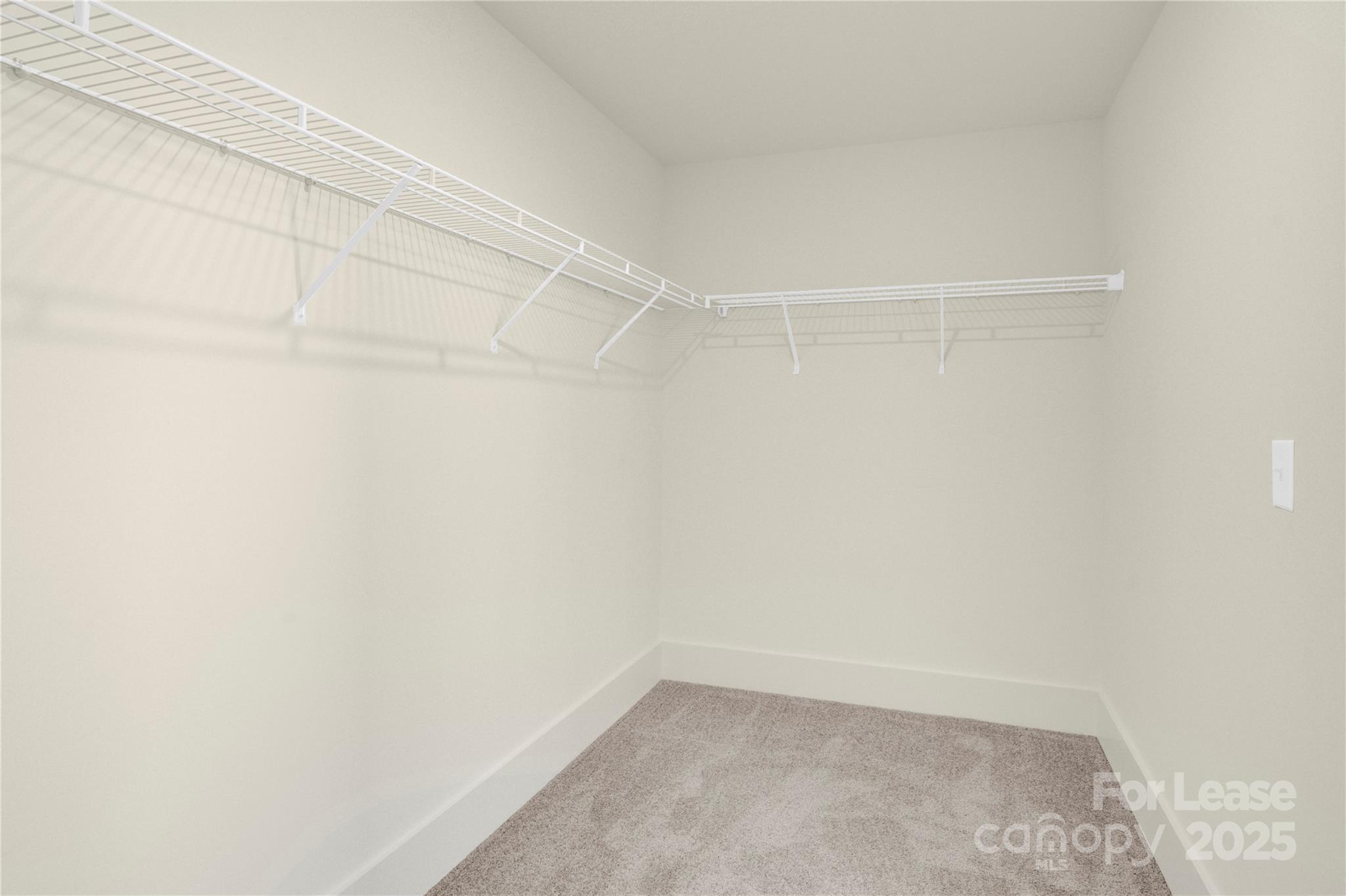 207 Aspire Circle, Unit 46 Wingate, NC 28174 - Photo 23 of 34 a view of a room with shelf