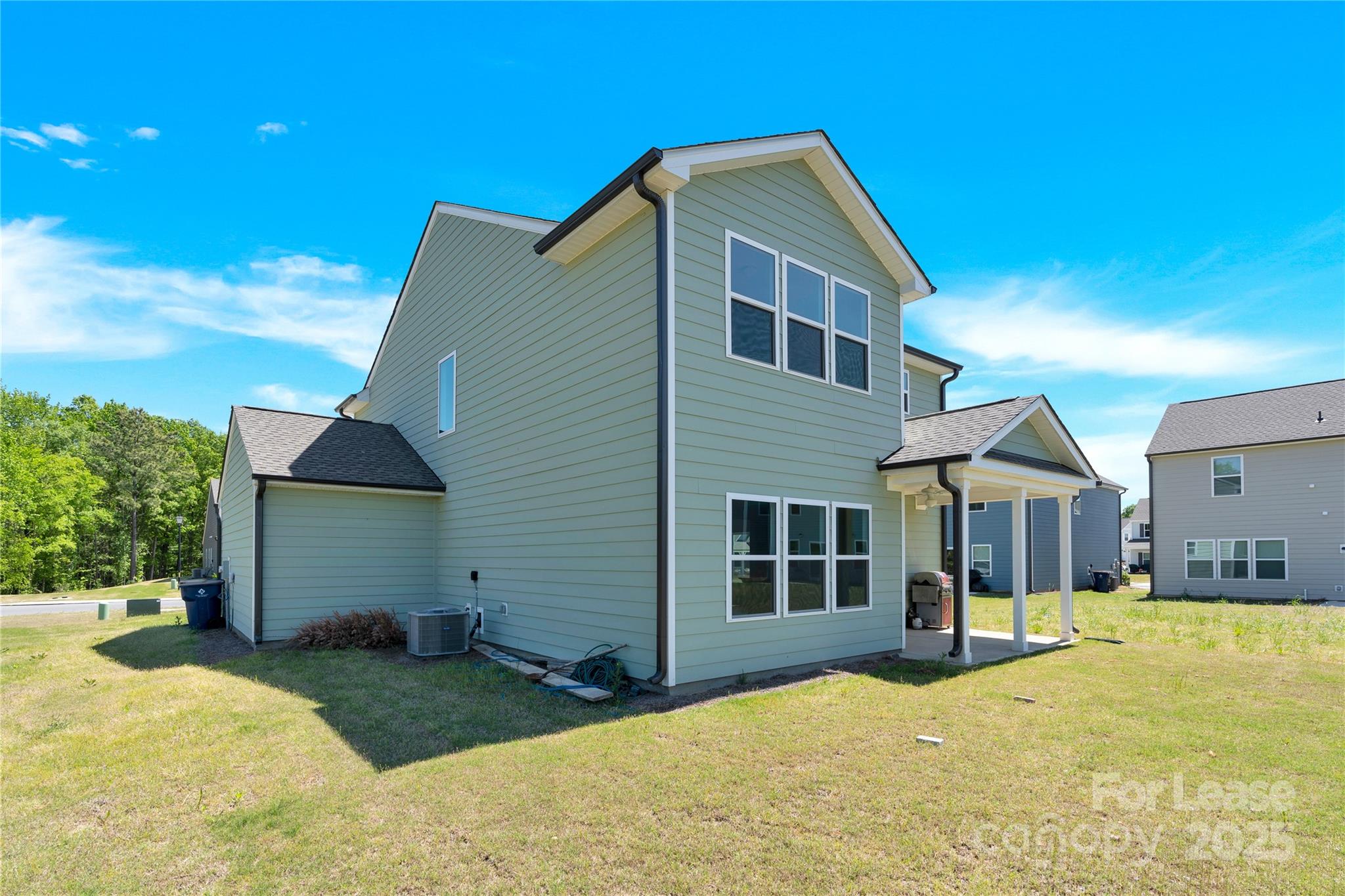 207 Aspire Circle, Unit 46 Wingate, NC 28174 - Photo 31 of 34 a front view of a house with a yard