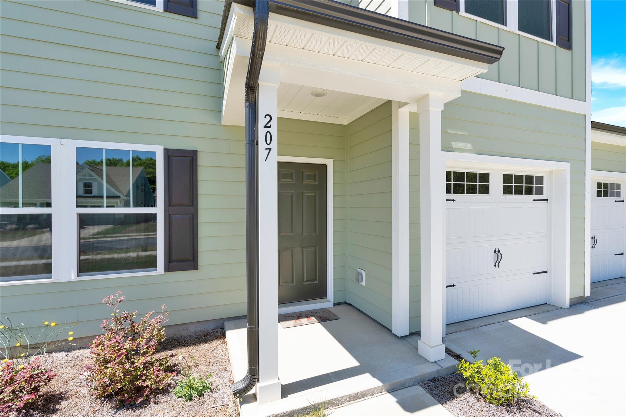 207 Aspire Circle, Unit 46 Wingate, NC 28174 - Photo 4 of 34 a front view of a house