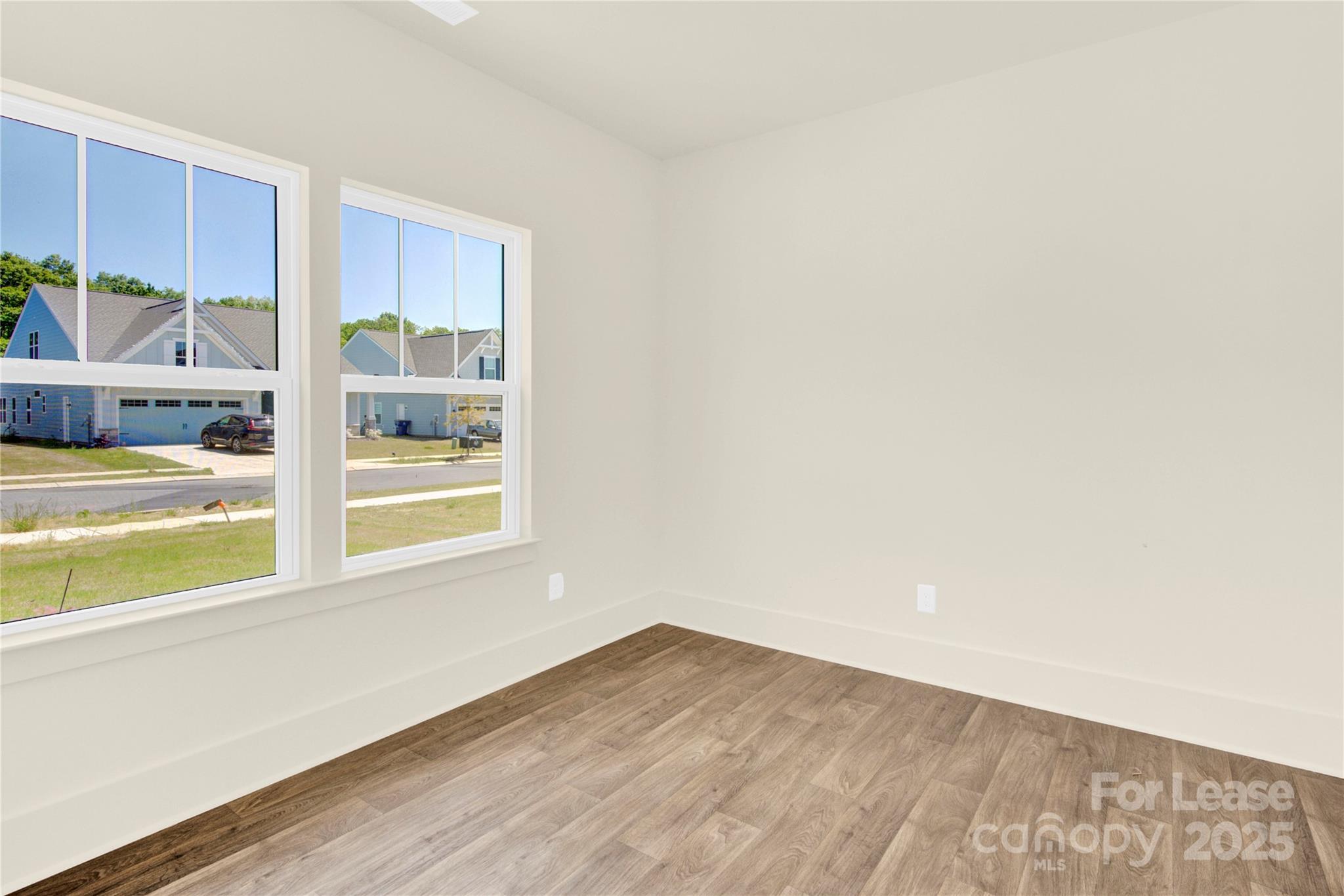 207 Aspire Circle, Unit 46 Wingate, NC 28174 - Photo 6 of 34 an empty room with a window